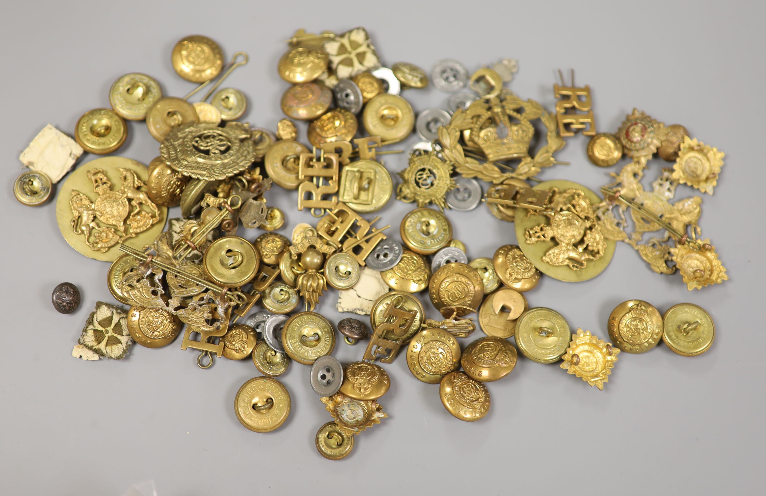 A group of Military badges and buttons